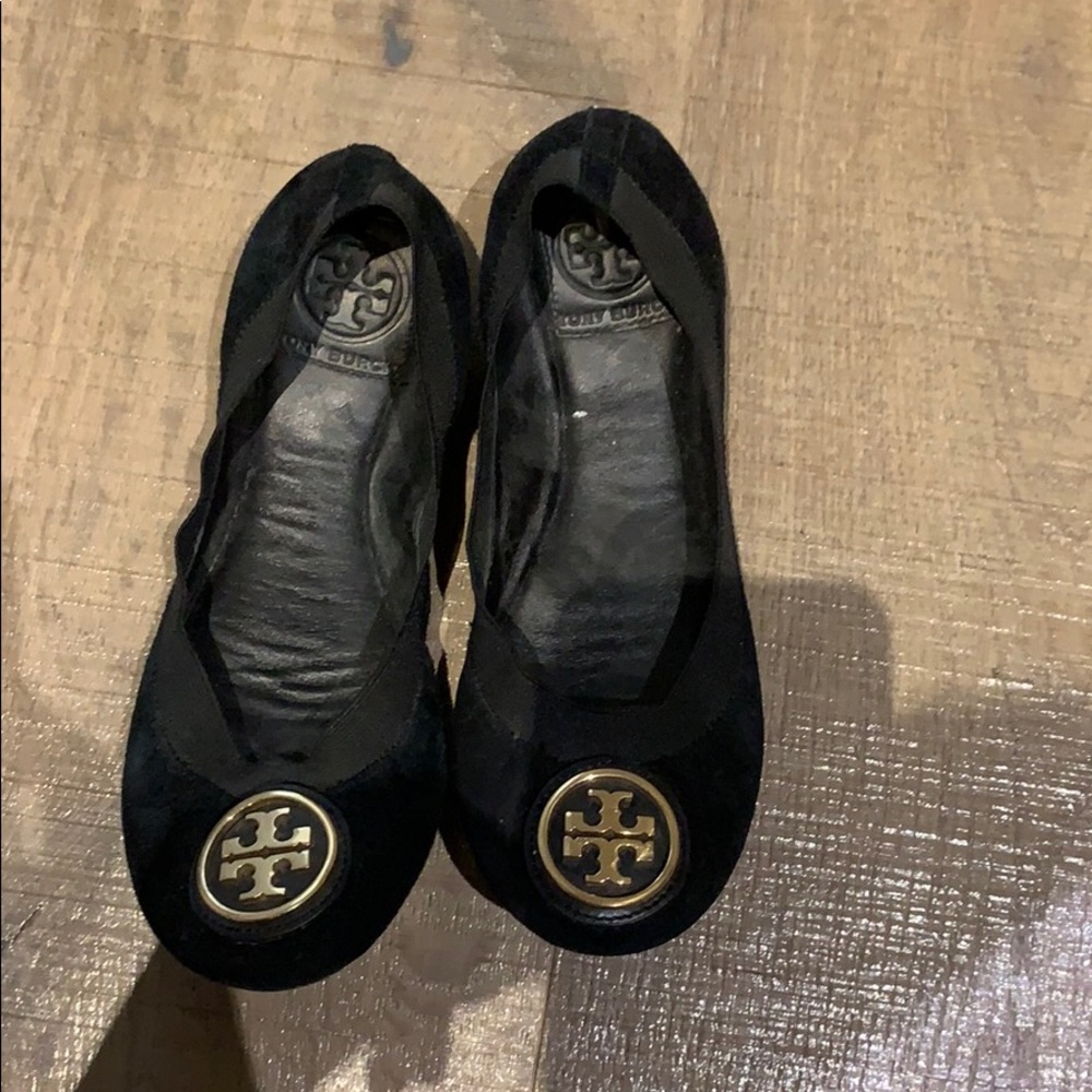Ladies Tory Burch black slip ons